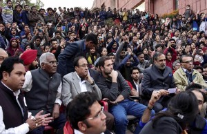 New Delhi: Congress vice president Rahul Gandhi and  CPI MP D. Raja, Congress leader Anand Sharma and others  sit with students of the Jawaharlal Nehru University (JNU) in New Delhi on Saturday. Gandhi, Raja and others left leaders went to the campus to meet the students  protesting for the release of Student Union president Kanhaiya Kumar.   PTI Photo by Kamal Kishore  (PTI2_13_2016_000270b)
